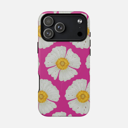 Vibrant pink phone case with white daisy flowers and yellow centers, stylish floral design for iPhone