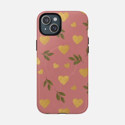 Pink phone case with gold glitter hearts and green leaves, stylish protective cover for iPhone