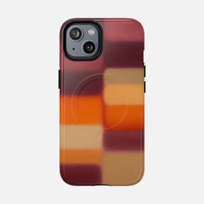 iPhone case with gradient plaid design in red, orange, and tan tones for stylish phone protection