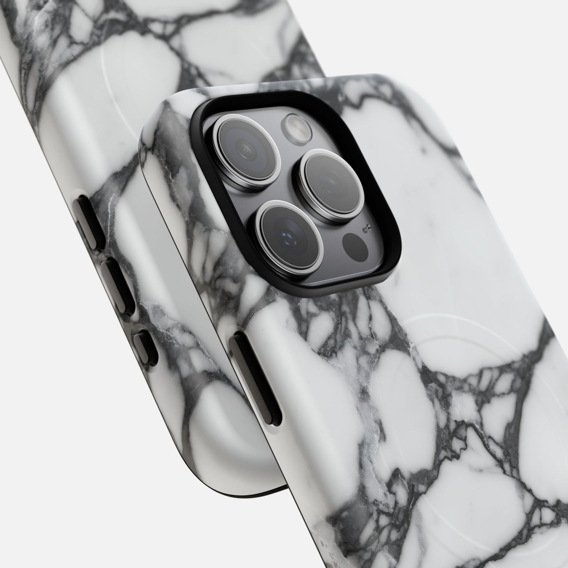 White and black marble phone cases with camera cutouts and modern design