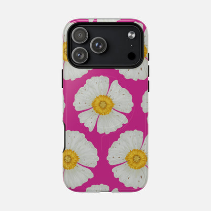 Vibrant pink phone case with white daisy flowers and yellow centers, stylish floral design for iPhone