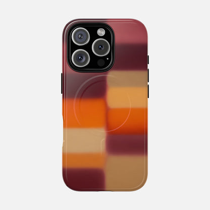 iPhone case with vibrant gradient stripes in red, orange, and tan, featuring modern design and camera cutout