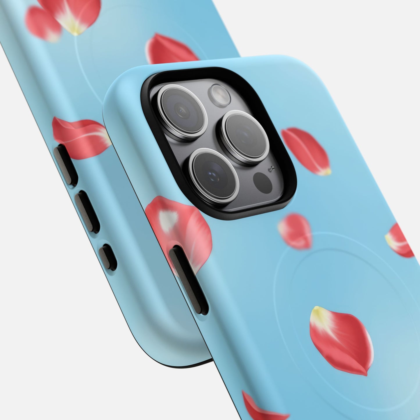 Light blue phone case with floating red rose petals design, fits iPhone Pro camera