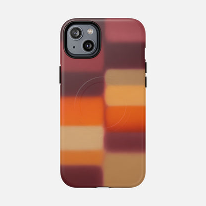 iPhone case with gradient plaid design in warm red, orange, and tan tones for stylish phone protection