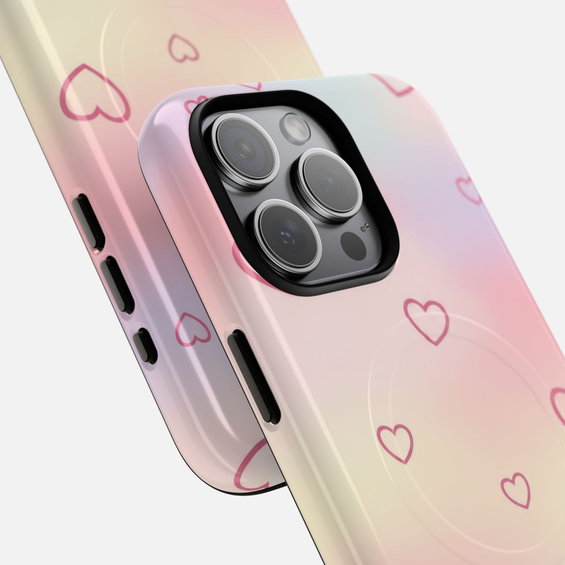 Pastel gradient phone case with pink hearts, designed for iPhone Pro models, featuring precise camera cutout and stylish protection.