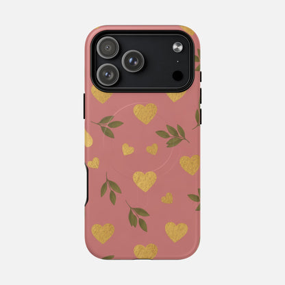 Pink phone case with gold hearts and green leaves, stylish protective cover for iPhone