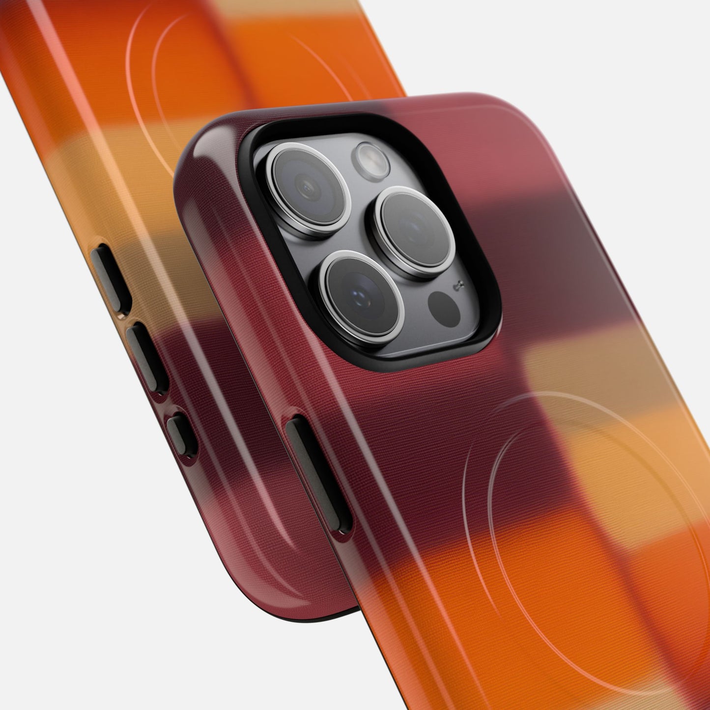 Vibrant orange-to-red gradient phone case with modern abstract design, protecting iPhone camera