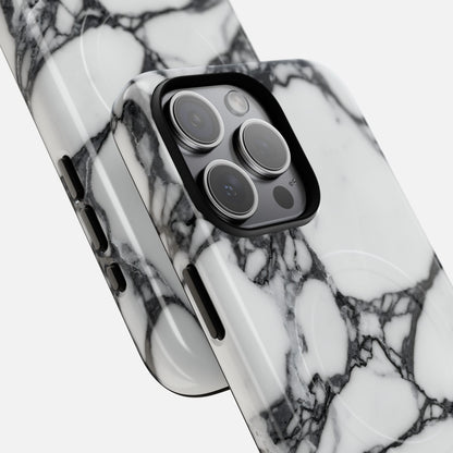 Black and white marble design phone case on modern smartphone, close-up view