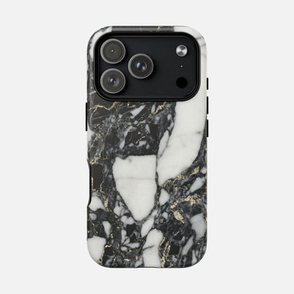 Black and white marble phone case with gold accents on smartphone