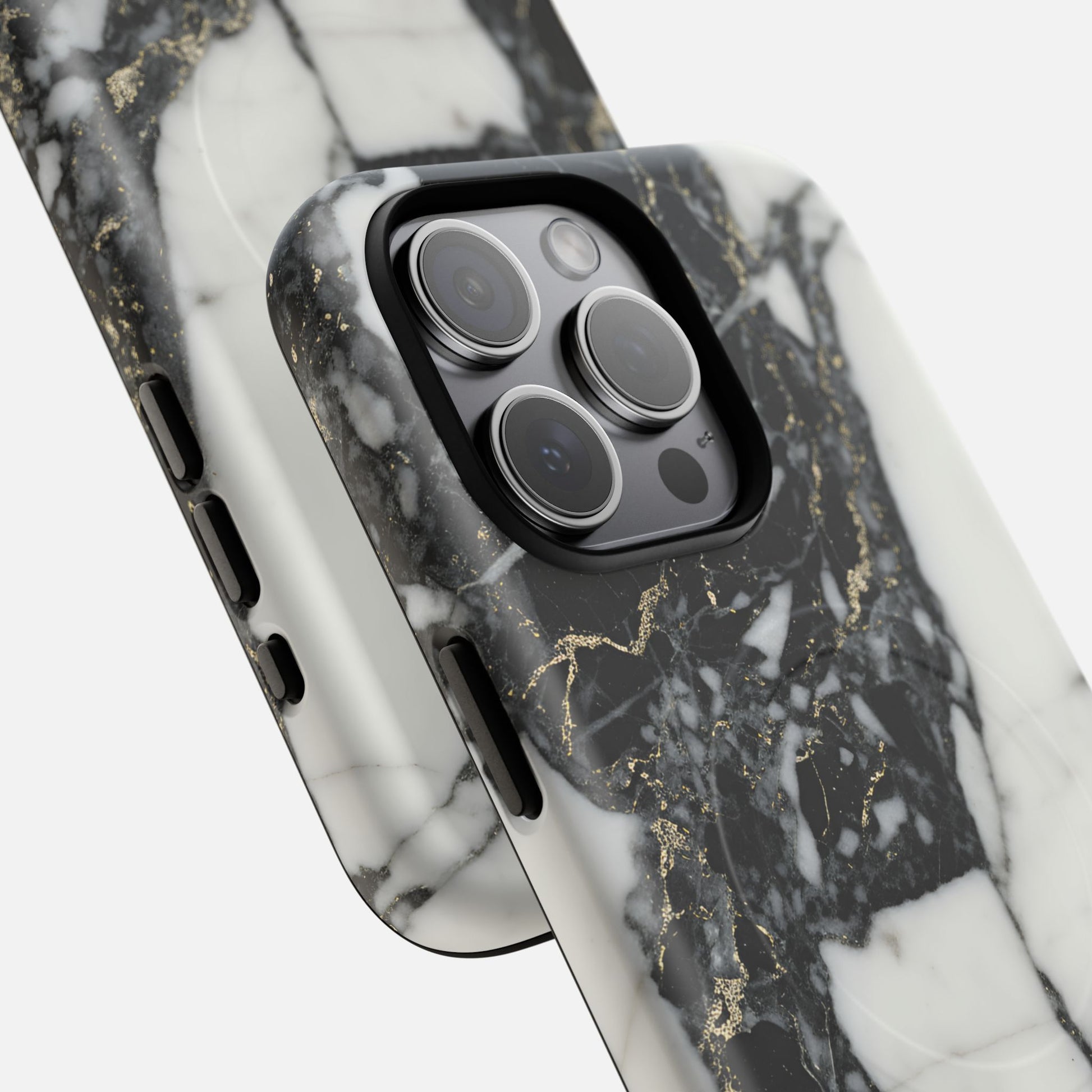 Black and white marble phone case with gold veining details, close-up on camera area