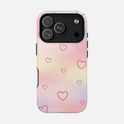 Pink gradient phone case with heart pattern, compatible with iPhone 15 Pro Max, featuring MagSafe support.