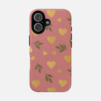 Pink phone case with gold glitter hearts and green leaves, stylish protective cover for iPhone