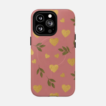 Pink phone case with gold hearts and green leaves, stylish protective cover for iPhone