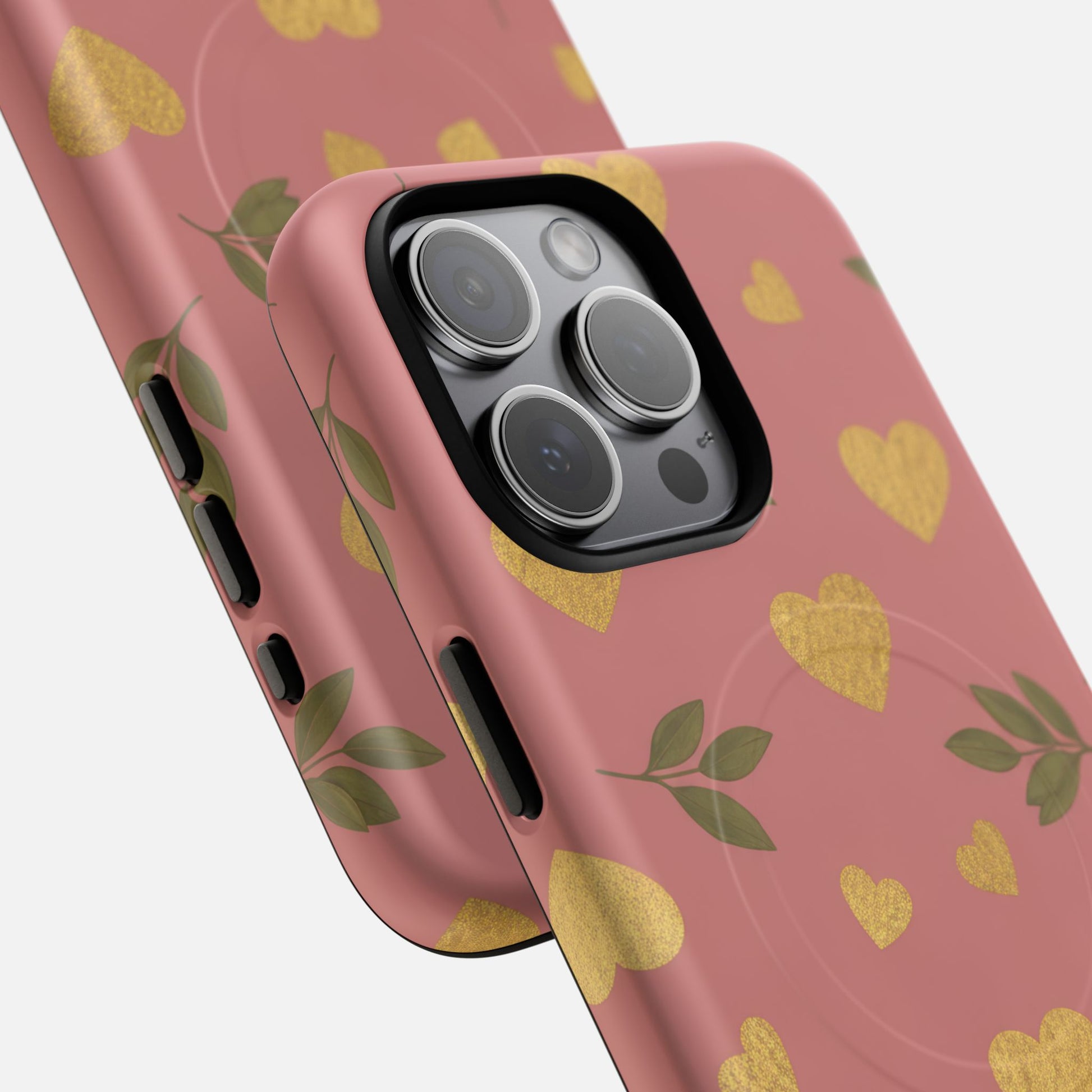 Pink phone case with gold glitter hearts and green leaves, stylish protective cover for iPhone