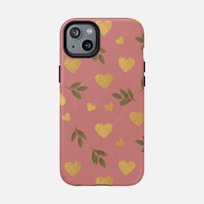 Pink phone case with gold glitter hearts and green leaves, stylish protective cover for iPhone