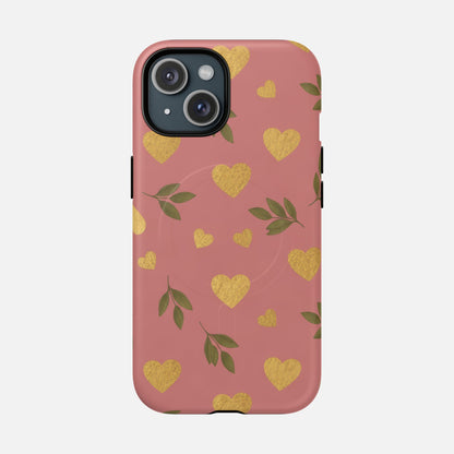 Pink phone case with gold hearts and green leaves, stylish protective cover for iPhone