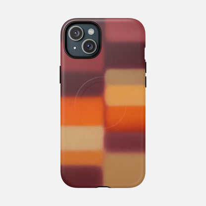 Phone case with modern geometric pattern in warm red, orange, and tan tones for iPhone protection
